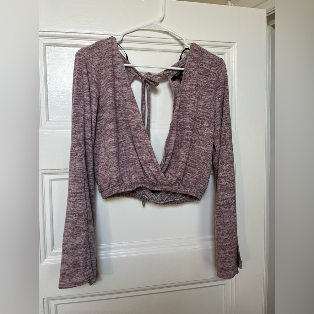 Purple long sleeve shirt with open back and deep neck cut